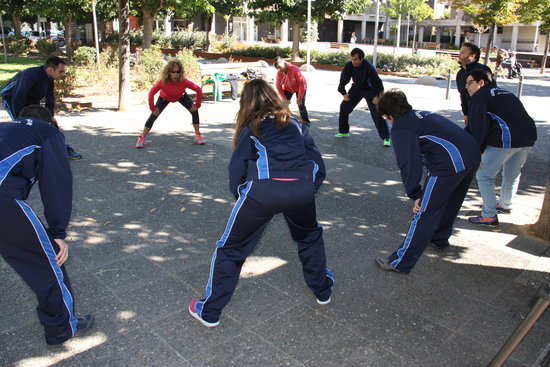 Members of Taller Claror who will compete in the Special Olympics Games at Seu d'Urgell and Andorra stretching on October 2 2018 (by Albert Lijarcio)